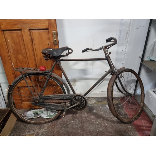 670 - A large, vintage men's bicycle with a Brook's spring support seat. A nice vintage display piece