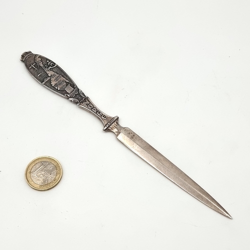 682 - A Norwegian silver letter opener, depicting the ship Hellig Olav of 1903-1934 by the maker Tone Knut... 