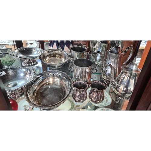 872 - A collection of 7 silver plated items including two teapots, two creamers with fluted edge, an ice b... 