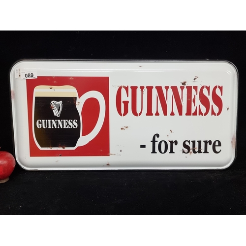 89 - A large  metal vintage style wall sign reading Guinness for sure.