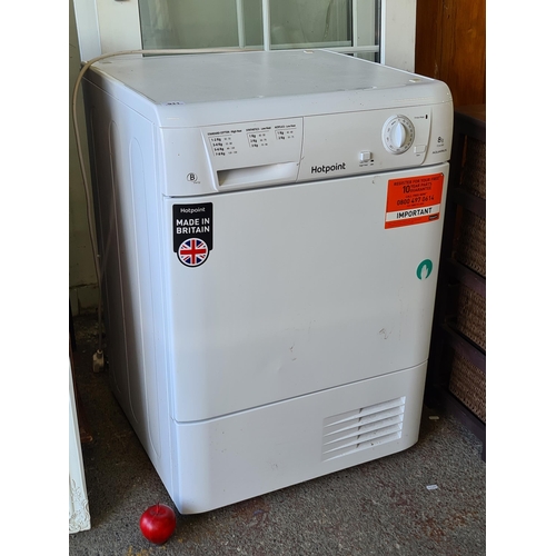 911 - A Hotpoint branded condenser dryer. An 8kg capacity example. Model TCM580 Aquarius. RRP £749.99 curr... 