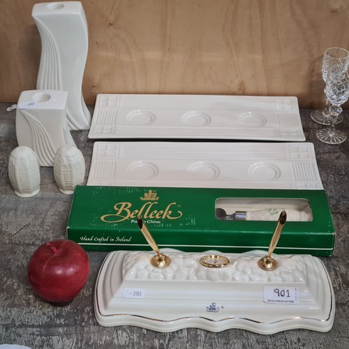 901 - A selection of eight Belleek branded items. Including a vintage desk tidy clock a boxed cake slice .... 