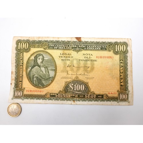 35 - Star lot : An excellent Lady Lavery 100 pound bank of Ireland note, dated 4/4/77. In good condition.