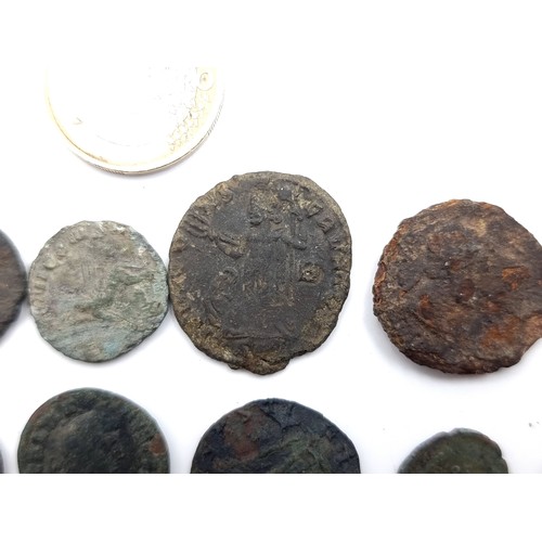 26 - An excellent collection of eleven ancient Roman coins. Ready for research.