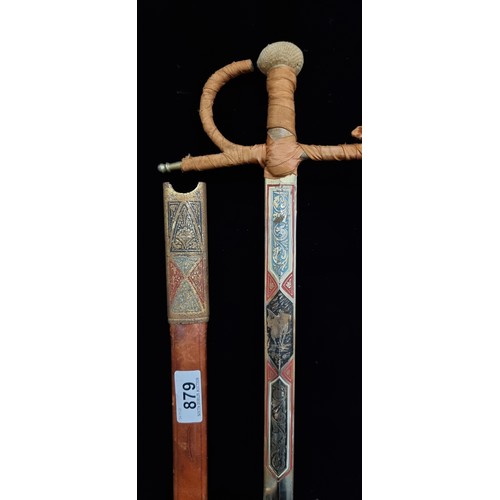 879 - A fabulous antique espada ropera sword with clothbound hilt, with ornate foliate incised detail with... 