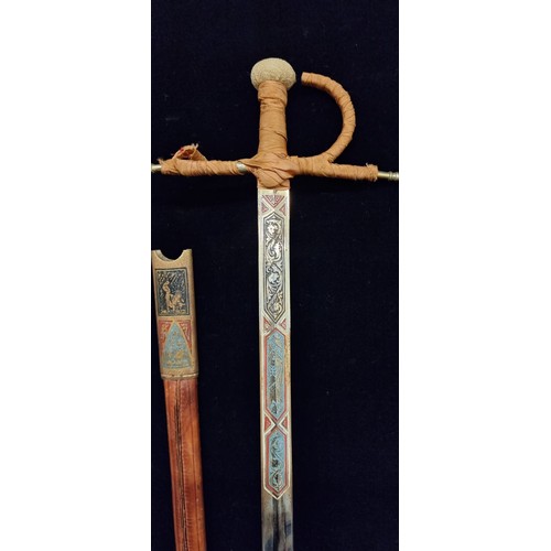 879 - A fabulous antique espada ropera sword with clothbound hilt, with ornate foliate incised detail with... 