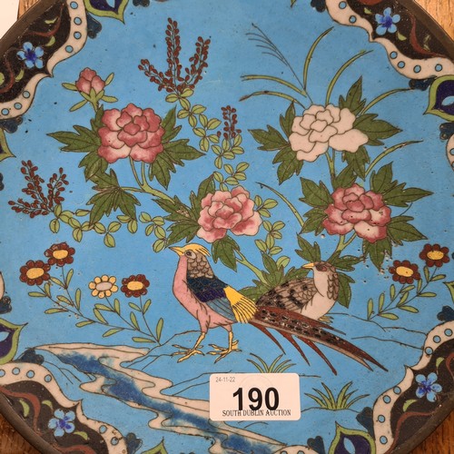 190 - A beautiful antique example of a cloisonne plate, a very striking design on a rich blue background d... 