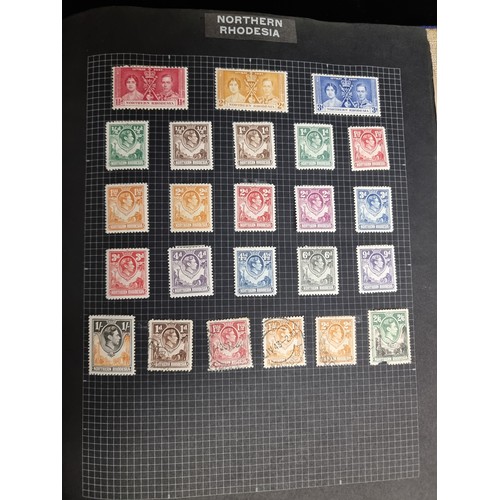 405 - An excellently furnished large stamp album, comprising of many multi national stamps and includes an... 