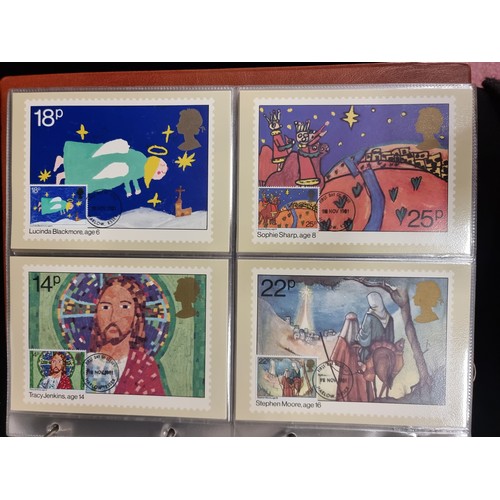 914 - A large album of over 60 First Day Covers from the 1980s