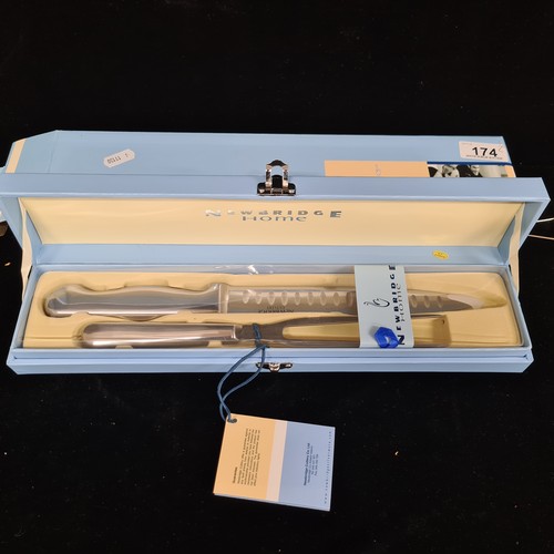 174 - A fabulous two-piece Newbridge Homeware carving set of stainless steel, brand new in original box.