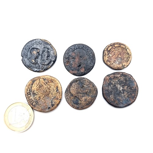 11 - An interesting collection of six ancient Roman coins. At least 1700 years old
