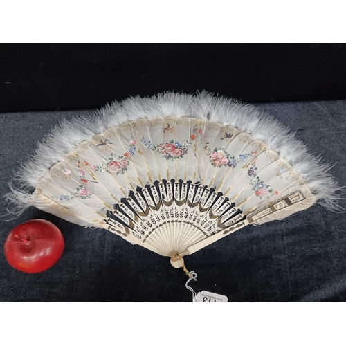 113 - Star Lot : A truly enchanting and antique hand fan crafted from swan feathers with an ostrich feathe... 