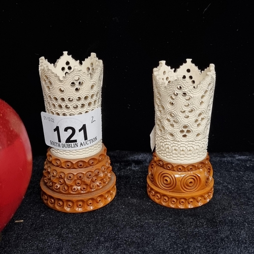 121 - A nice pair of Antique petite Chinese bone plinths, with profuse pierced decoration and concentric c... 