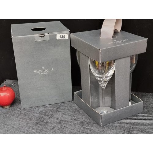 139 - A brand new set of four white wine stemmed glasses by Waterford Crystal in the Siren Series. RRP €15... 