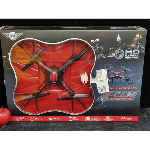 140 - A remote controlled X-CAM Quadcopter. By Flying Gadgets brand. With a HD camera, gyroscopic stabiliz... 