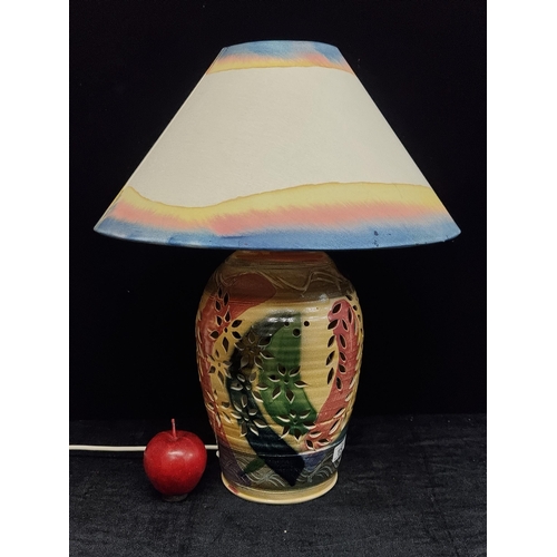 157 - A striking Michael Kennedy ceramic table lamp. With a pierced ceramic body featuring stylised floral... 