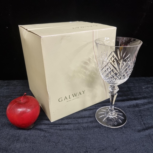 194 - A set of four stemmed wine glasses in the Clarendon Goblet Series by Galway Crystal. Brand new in or... 