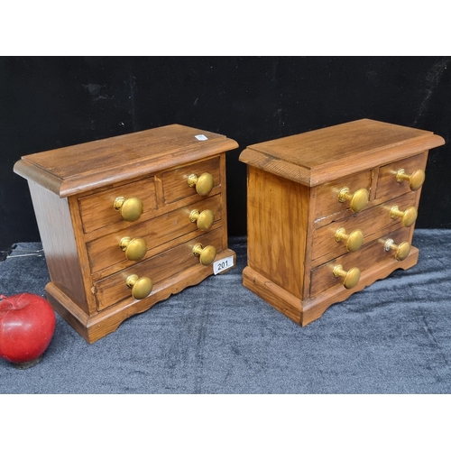 201 - A pair of very interesting neat-sized, carved wooden jewellery boxes. Each with four drawers apiece.... 