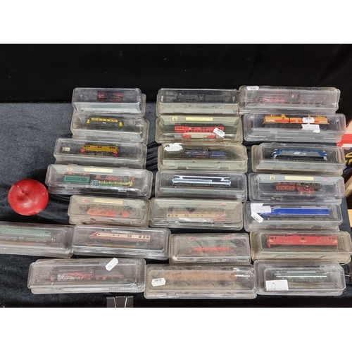 204 - A large selection of twenty-two vintage boxed model trains by the collectable brand DelPrado. Includ... 