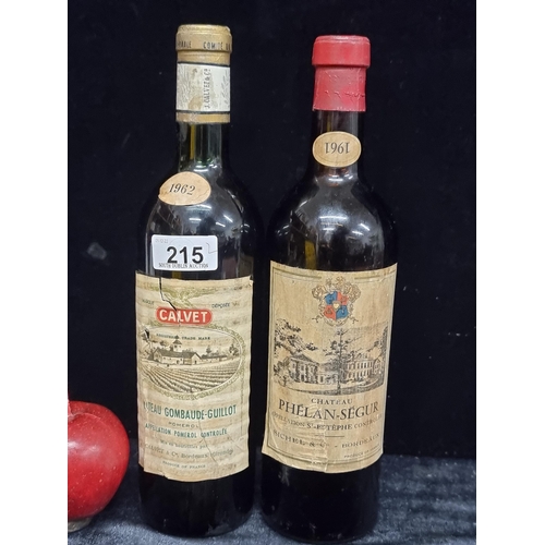 215 - Two bottles of vintage wine, including a 1961 Chateau Phélan-Ségur, label intact (RRP €286, on wine-... 