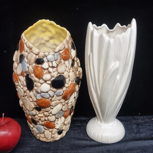 234 - Two vintage Sylvac vases, including one white alabaster example with daffodil stem design, and anoth... 