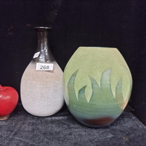 268 - 2 beautiful ceramic vases from the workshop of Spanish ceramicist Cesar Manrique. The first is an ex... 