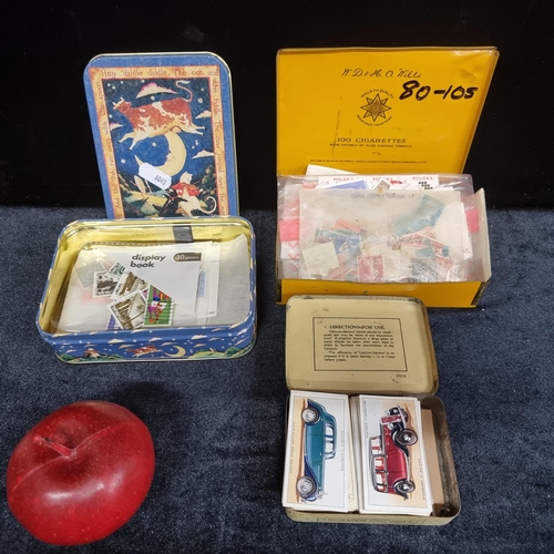 293 - A selection of 3 vintage collectable items, including Player's Cigarettes cards and various world st... 