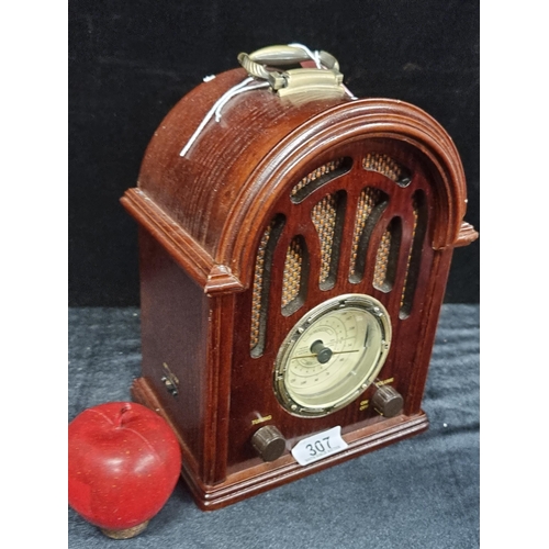 307 - A Daklin radio model 9719C in the style of an antique radio.