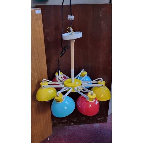 337 - A fabulous TITTI PL6 contemporary chandelier in vibrant shades of yellow, red and baby blue. RRP: €1... 