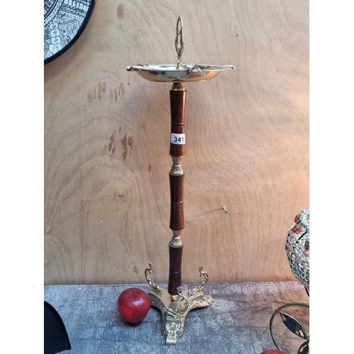 341 - A lovely looking floor standing ashtray with gold toned cast metal fittings and turned wood column. ... 