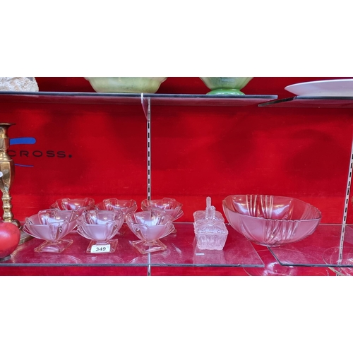 349 - A selection of nine pieces of 1930s rose-pink glass. Including a full set of Art Deco trifle bowls w... 