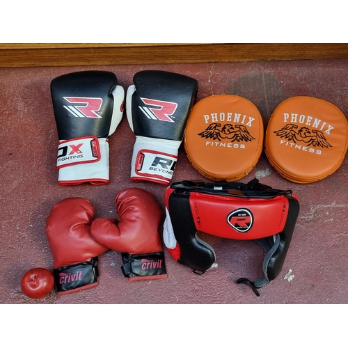 356 - A large bag containing martial arts sparring gear. Including RDX GelTech boxing gloves 16oz. RDX Gel... 