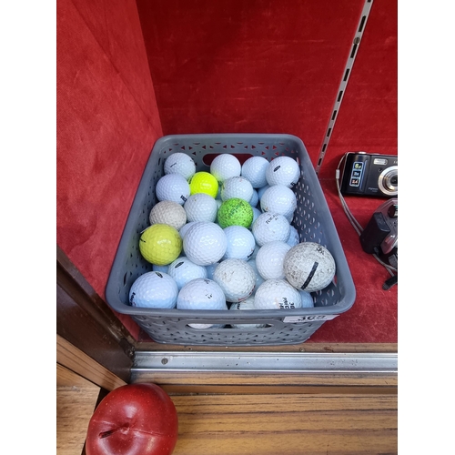 368 - A good collection of golf balls including Ultra Pinnacle and Titleist ProV1.