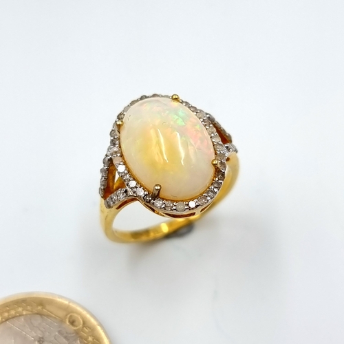 437 - Star Lot : A fabulous  beautiful large Australian Fire Opal and Diamond ring, with a beautiful hued ... 