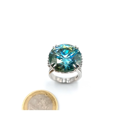 439 - A mesmerising Ocean Blue Moissanite ring, of an immense 25.5 carats and set in sterling silver. Ring... 