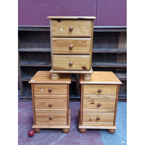 464 - Three good quality pine bedside lockers, with three deep drawers and large bun feet. Two measuring 6... 