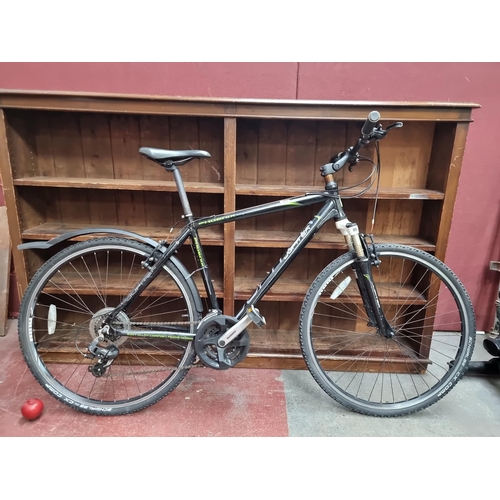 468 - A Phoenix Jupiter bicycle with a 6061 alloy comfort frame, leather saddle and shimano brakes. In ver... 