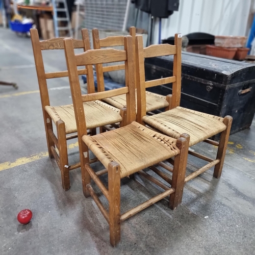 486 - Four matching Irish sugan chairs, with oak frames and traditional woven seats. A lovely rustic quali... 