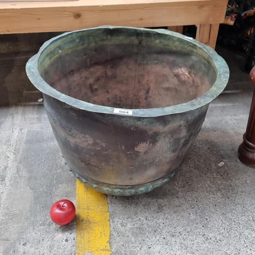 504 - A very large, 19th century copper vat with hammered rivets to base. Really wonderful age and aesthet... 