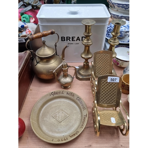 507 - A collection of eight good brass items, comprising of a lovely brass tea pot with etched floral deco... 