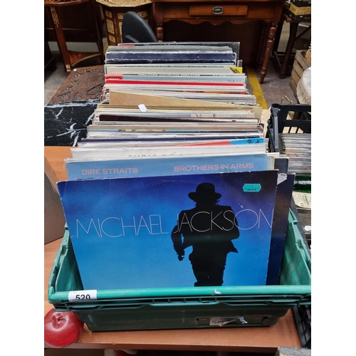 520 - Approx 140 vinyl records including artists such as Michel Jackson, Thompsons Twins, Dire Straits, Fo... 