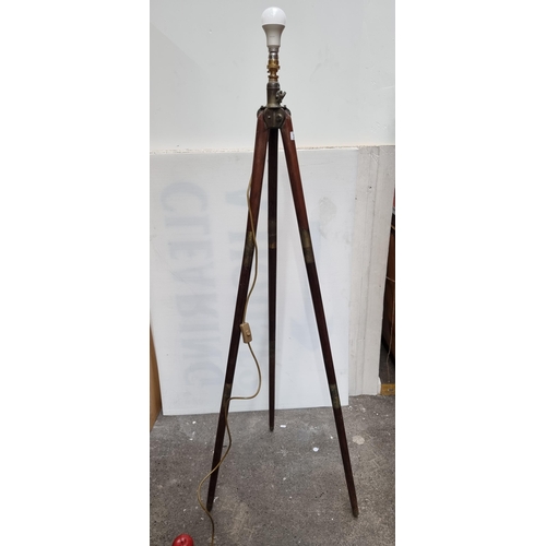 525 - A fantastic, Edwardian tripod stand. With brass hardware and turned mahogany frame. Upcycled to acco... 