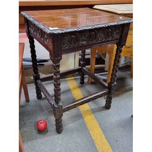 527 - An antique, Jacobean Revival washstand. With profusely carved details and Catherine wheel motifs. Su... 