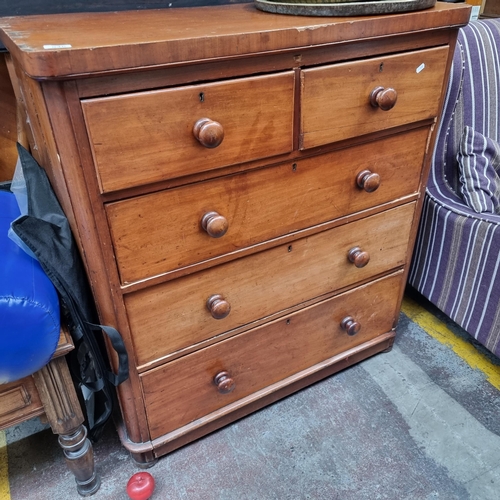 546 - Star lot : A large Victorian honey mahogany chest of five drawers with turned wooden handles. Brass ... 