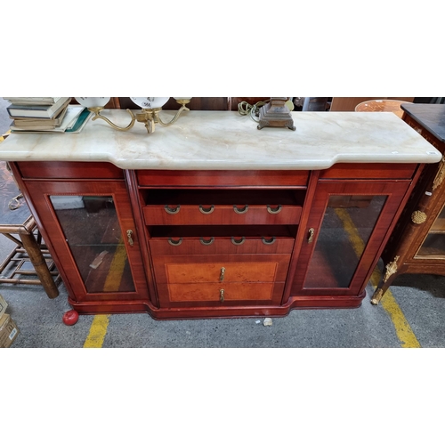 568 - Star lot : A stunning Italian sideboard with two glass fronted cupboards to side, two drawers below ... 