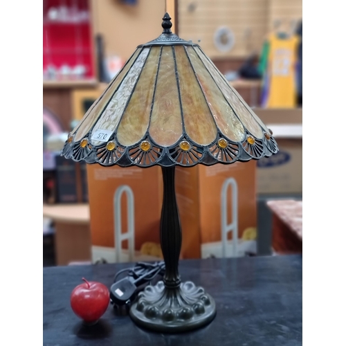 570 - A very heavy table lamp with beautiful carved wood base, fluted stem and a Tiffany style glass shade... 