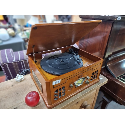 575 - An Itek record player in wooden box model no. IT142, with additional AM/FM radio, cassete and CD fun... 