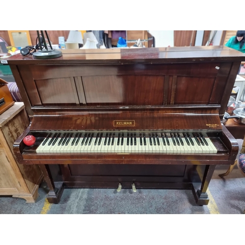 578 - Star lot : A fantastic Kelman upright piano by Godrey and Co. Southsea. All keys intact with nice, r... 