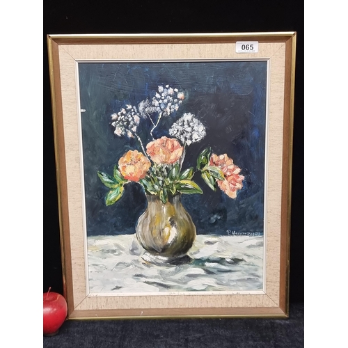 65 - A charming original oil on canvas painting signed P. Hennessy and dated to 1972. Features a still li... 