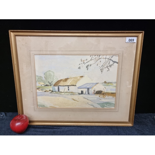 69 - A lovely vintage Irish School watercolour on paper painting depicting a traditional thatched cottage... 